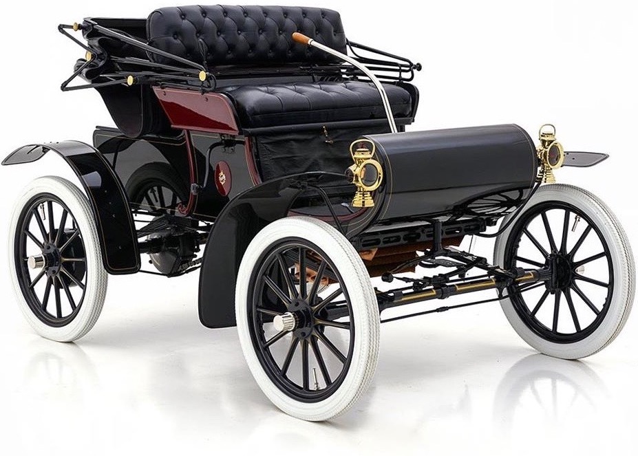 A 1904 Oldsmobile — an early car styled like a motorised carriage.